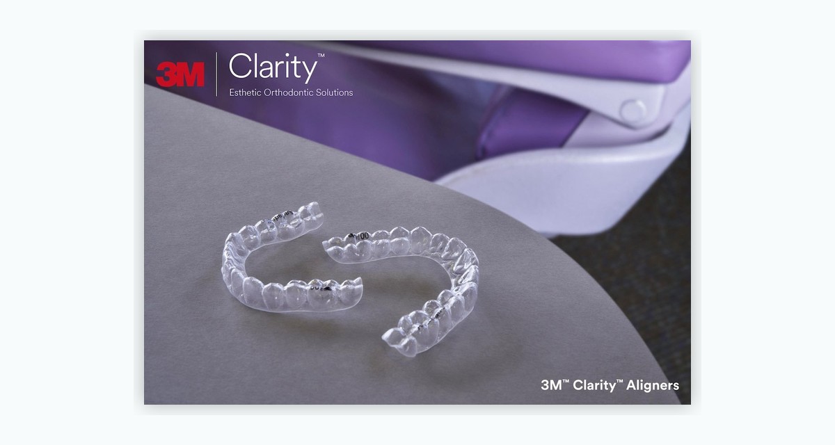 3M Clarity clear aligner trays displayed on a purple tabletop